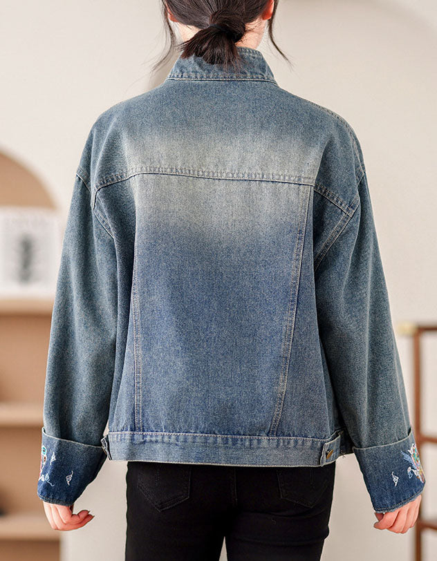 Women’s vintage style denim jacket with floral embroidery back view