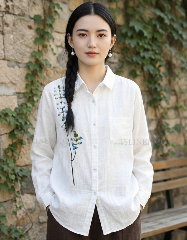 Women’s white embroidered floral button down shirt front view