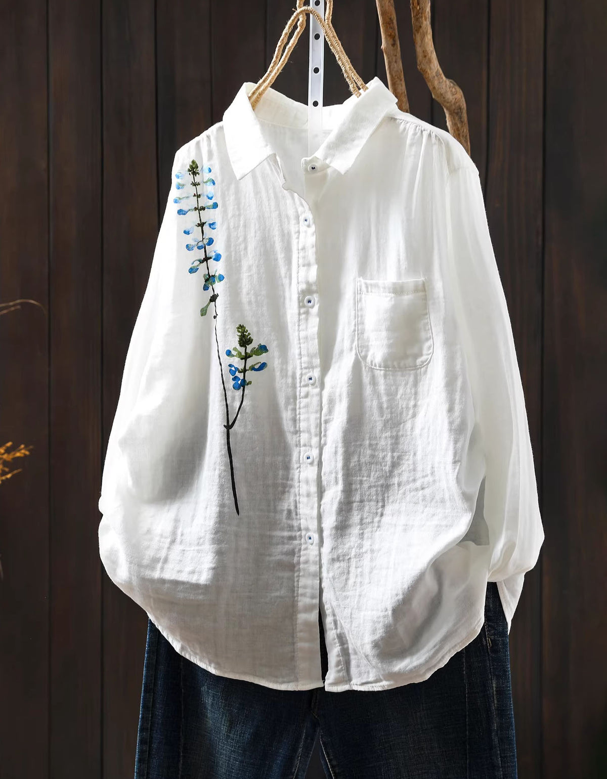 Elegant white shirt with floral embroidery women relaxed fit front view