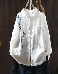 Elegant white shirt with floral embroidery women relaxed fit front view