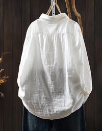 Button-up white shirt with blue floral design women casual wear back view