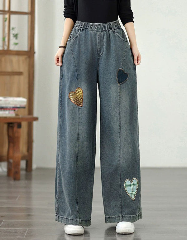 Women’s wide-leg denim pants with heart patch details and elastic waistband