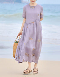 Front view of women's vintage floral linen dress with short sleeves
