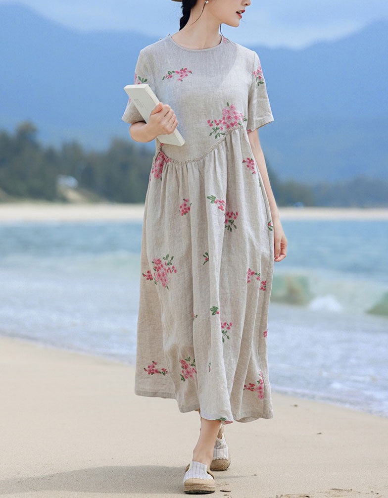 Women's linen floral dress worn for beach vacation and summer travel