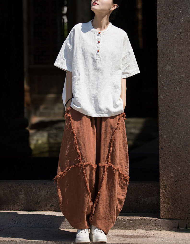 Front view of women’s breathable linen harem pants brick red