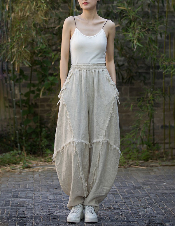 Front view of women’s loose fit linen harem pants beige 