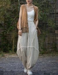 Front view of women’s breathable linen harem pants beige