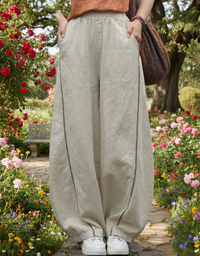 Women’s beige loose harem pants elastic waist front view