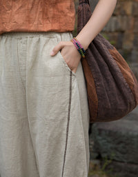 Casual loose harem pants women walking outfit close-up