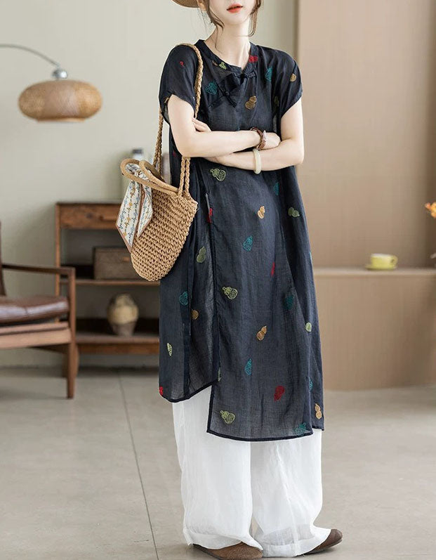 Women's vintage navy linen tunic dress styled with white pants