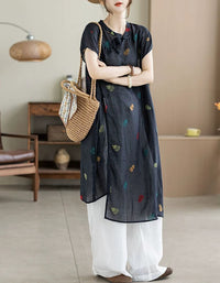 Women's vintage navy linen tunic dress styled with white pants