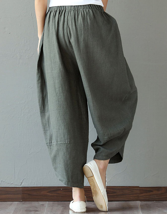 Back view of army green loose floral patch pockets linen harem pants for women