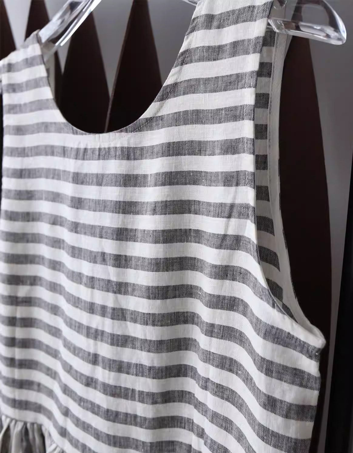 Women wearing striped linen midi dress sleeveless