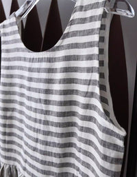 Women wearing striped linen midi dress sleeveless