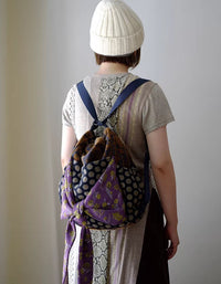 Stylish women’s floral print polka dot drawstring bucket bag with bow tie detail for casual wear