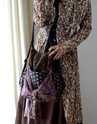 Women’s multifunctional polka dot backpack shoulder bag styled for casual wear