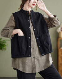 Side view of black women’s oversized cotton vest with button-up design