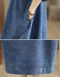 Details of relaxed oversized denim midi dress designed for comfort