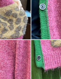 Close-up of green ribbed cuff and hem trim on pink cardigan
