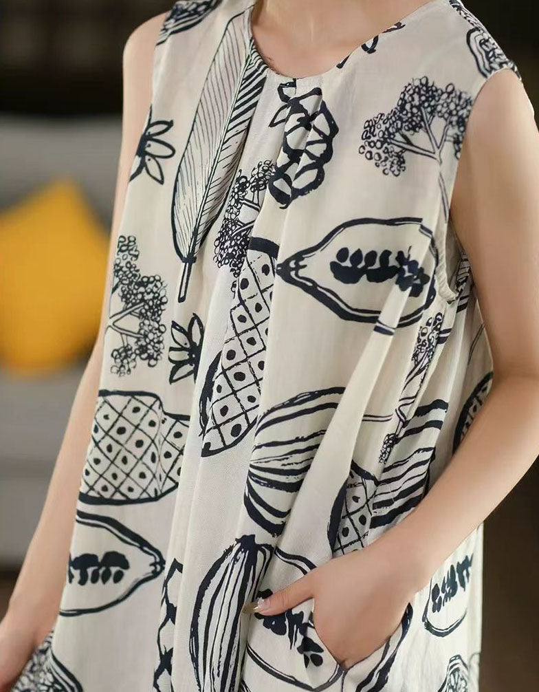 Person wearing a white scarf with black abstract patterns