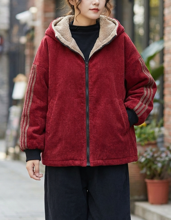 Vintage red corduroy hooded jacket for women displayed on hanger