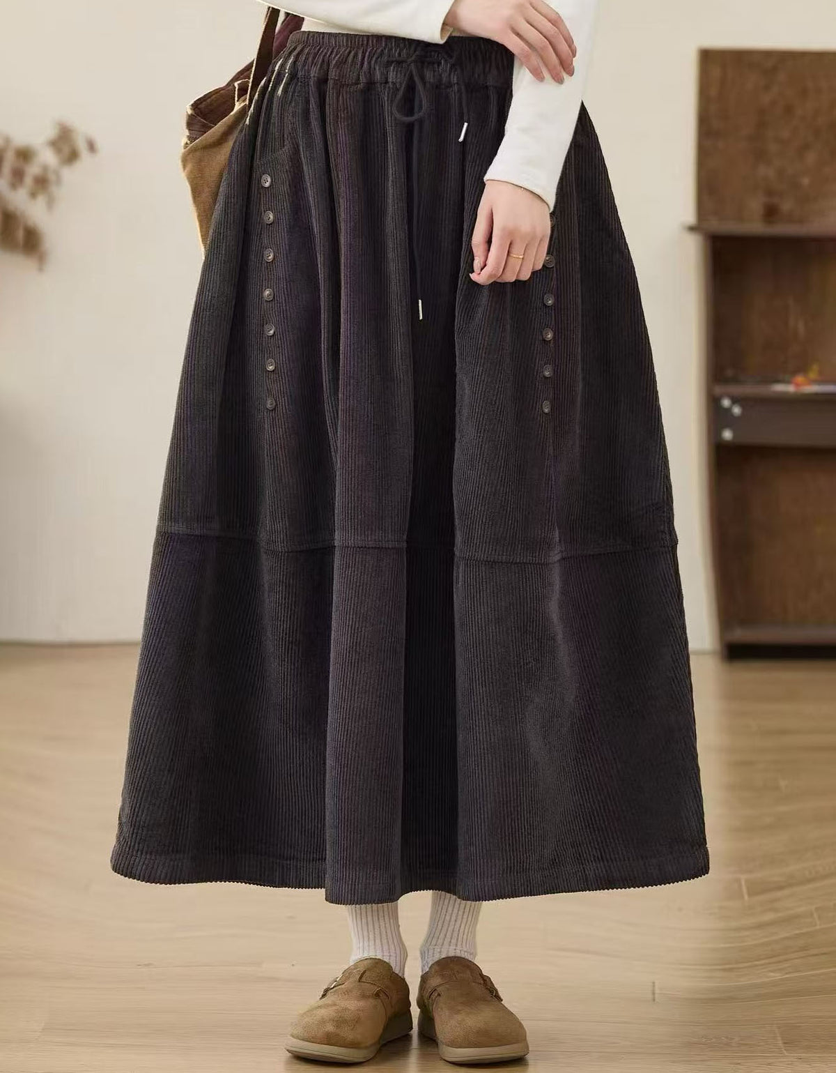 Women’s brown corduroy skirt with elastic waistband and adjustable drawstring