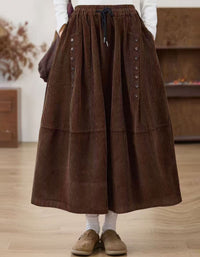 Brown corduroy midi skirt for women with button detail and A-line silhouette