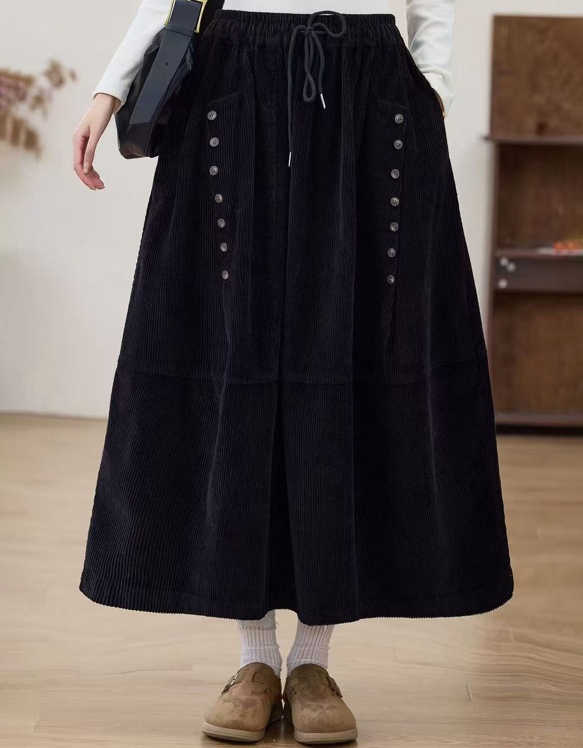 Women’s vintage-inspired brown corduroy A-line midi skirt outfit
