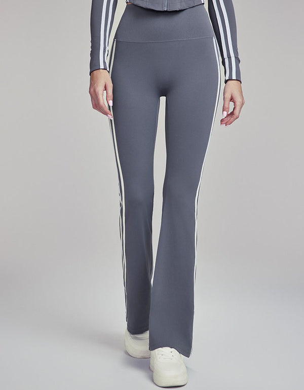 Gray leggings with white stripes on a plain background