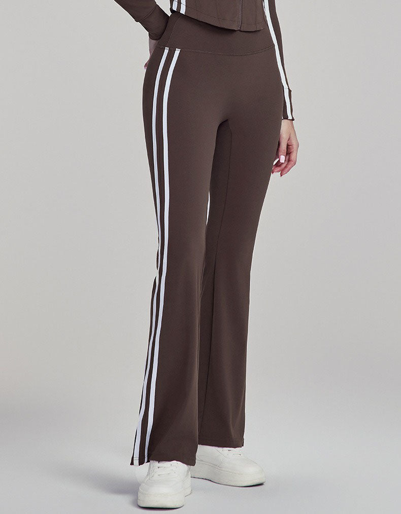 Coffee color pants with white stripes on a gray background side view