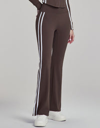 Coffee color pants with white stripes on a gray background side view