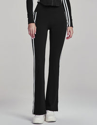 Black pants with white stripes on a gray background