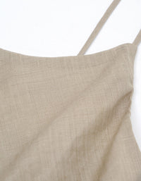 Close-up of a beige linen top on a white background