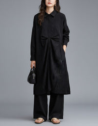 Oversized beige tunic dress layered with wide leg pants