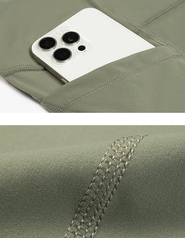 Close-up of a green fabric pocket with showing stitching detail