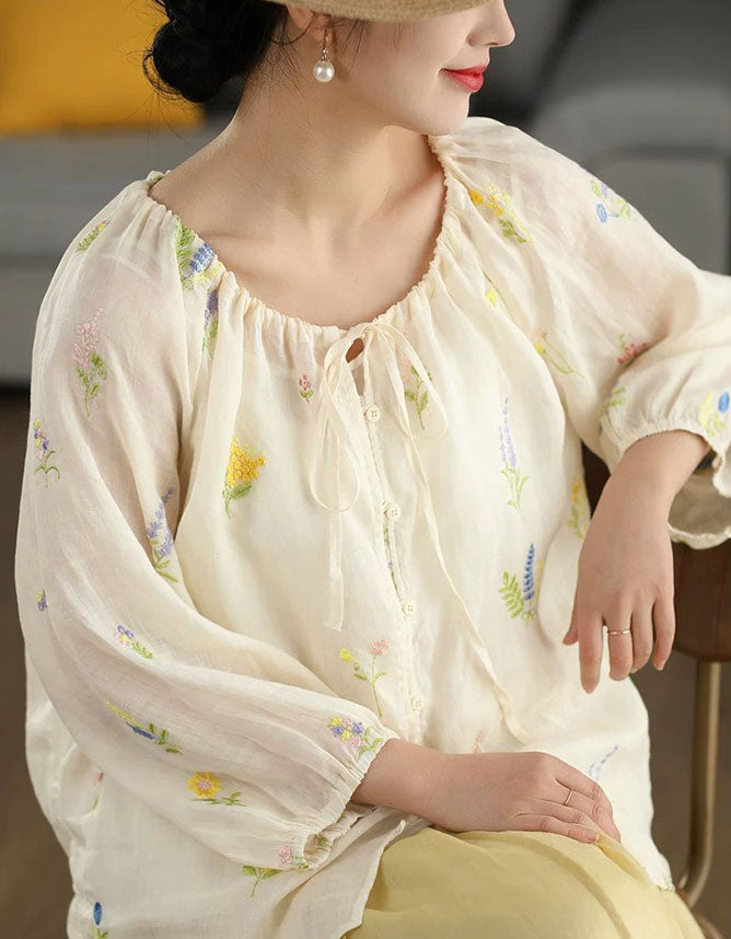 Women vintage embroidered blouse paired with casual outfit