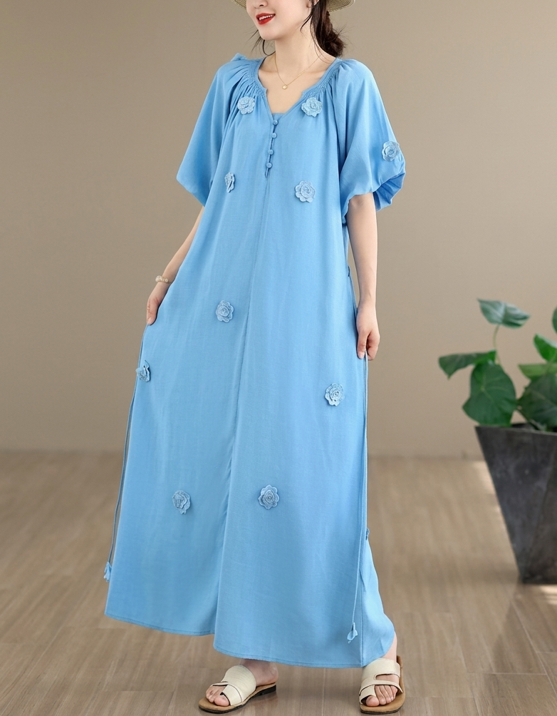 Relaxed fit women’s maxi dress with soft fabric and floral accents