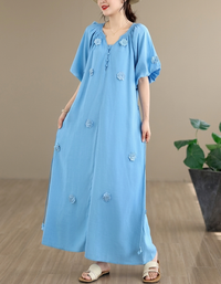 Relaxed fit women’s maxi dress with soft fabric and floral accents