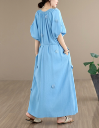 Lightweight breathable summer dress for women in soft blue color