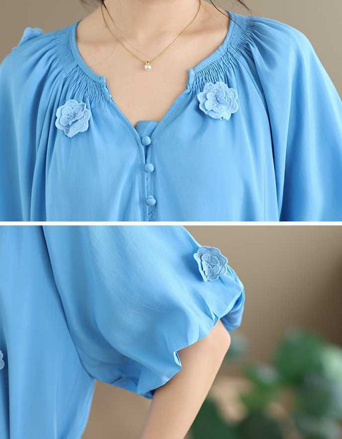 Close-up of Lightweight breathable summer dress for women in soft blue color