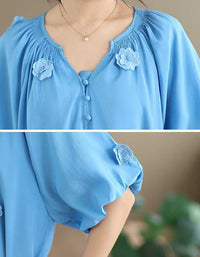 Close-up of Lightweight breathable summer dress for women in soft blue color