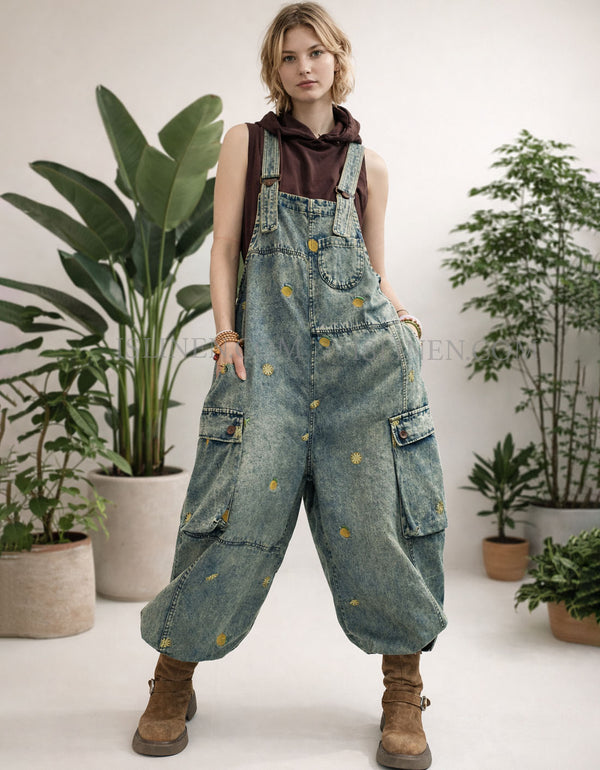 Baggy vintage wash denim overalls with wide legs and cargo pockets, front view on model.