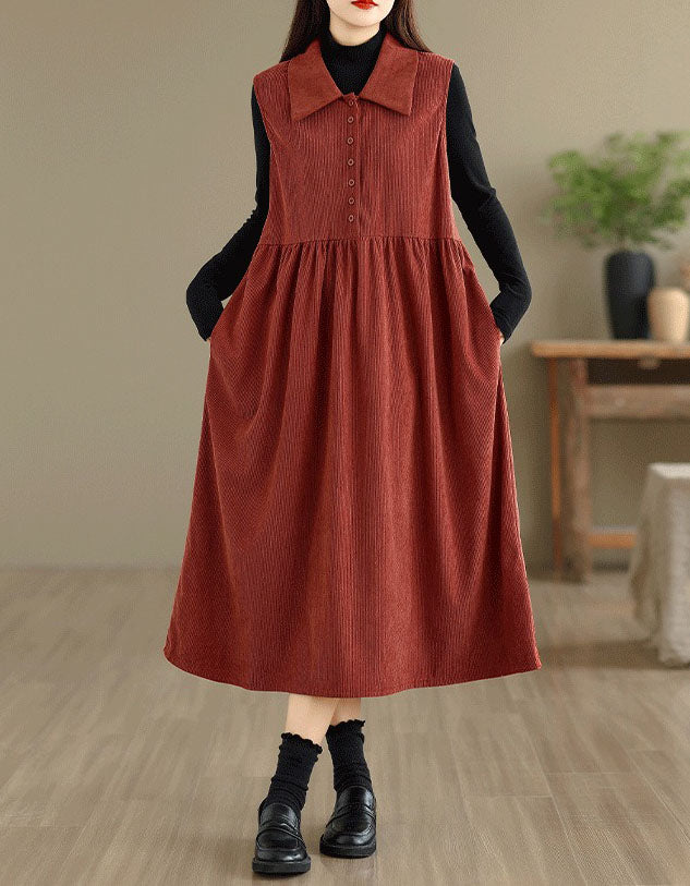 Women’s rust red sleeveless midi dress with button front and loose fit