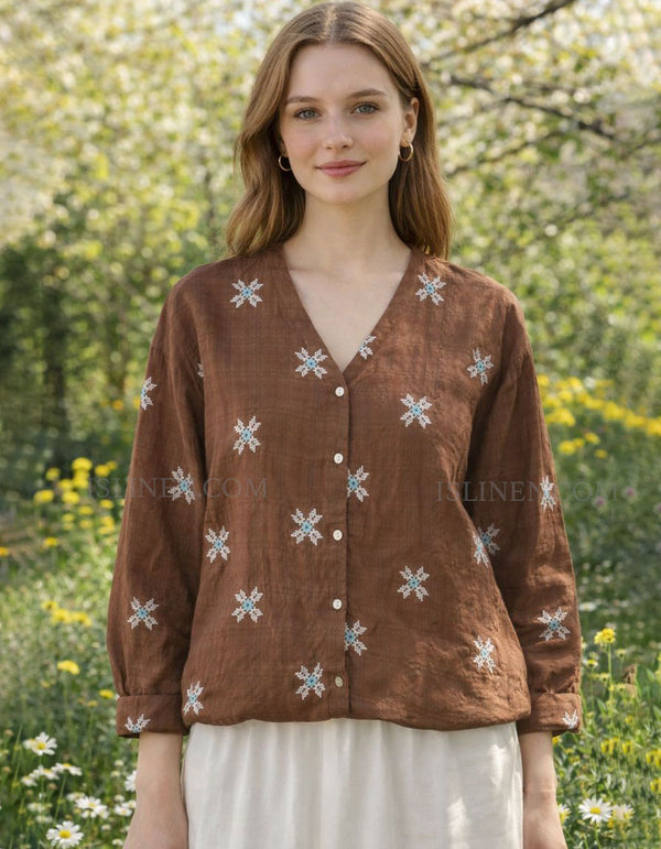 Brown embroidered blouse with snowflake patterns