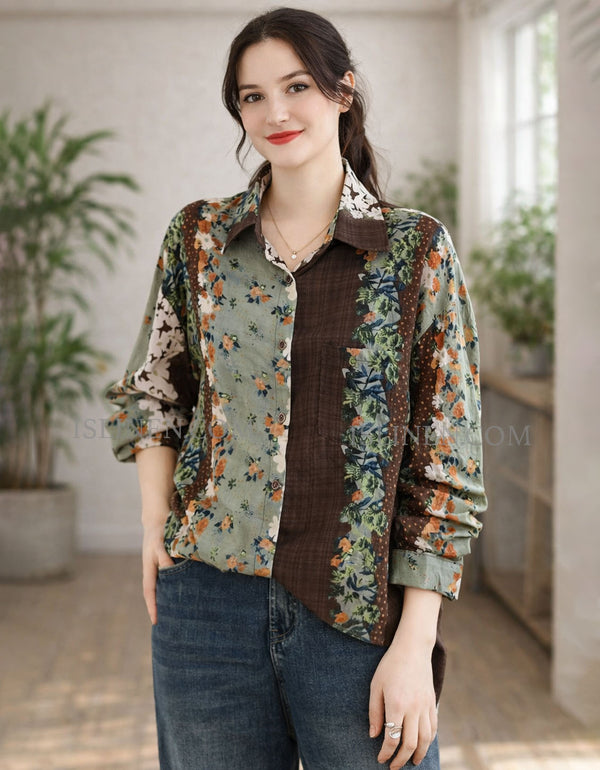 Woman wearing a floral shirt over a brown top with blue jeans indoors.