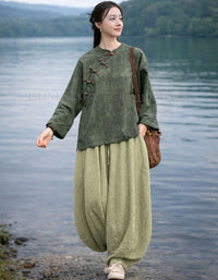 Relaxed fit green linen shirt with buttons front view