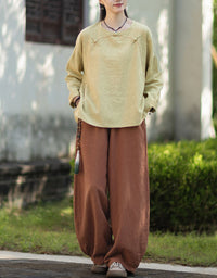 Loose fit yellow linen cotton blouse with stitch detail