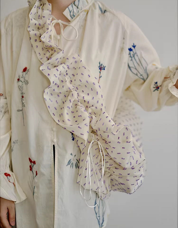 Open view of small ruffle shoulder bag with drawstring top showing compact interior for daily essentials