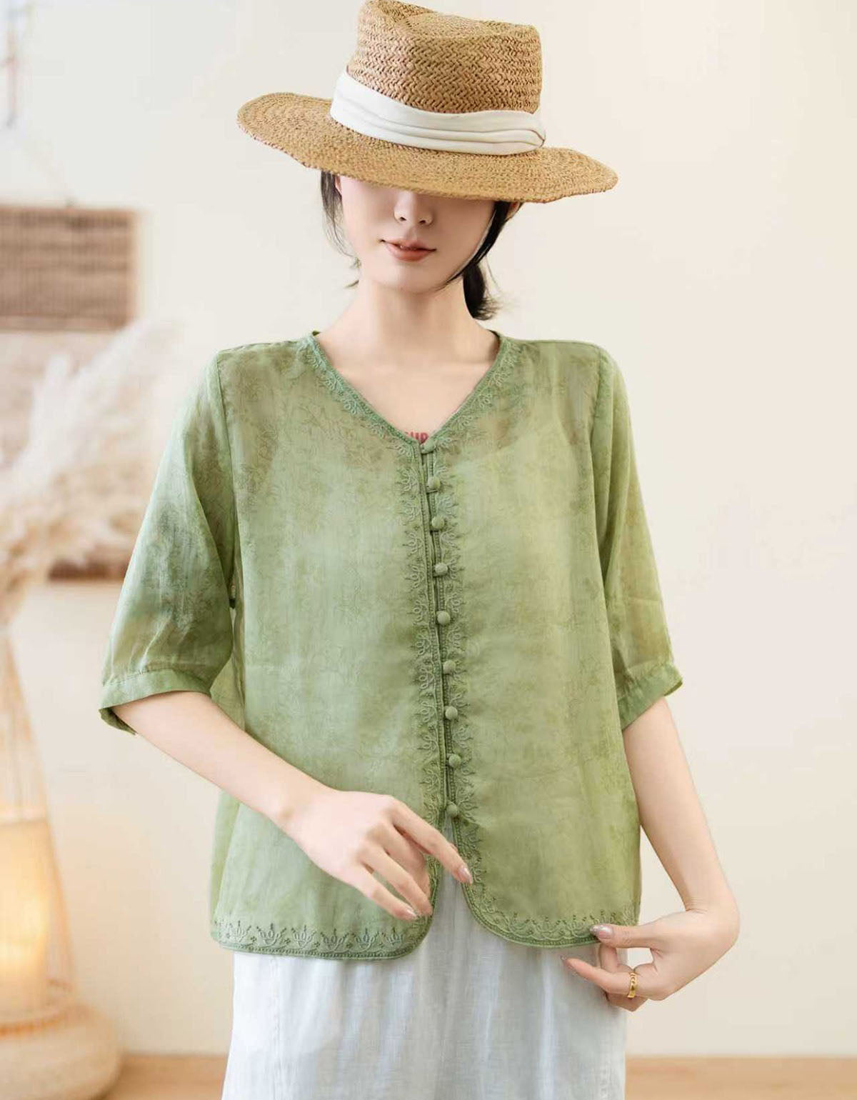 woman wearing lightweight linen button front blouse short sleeve