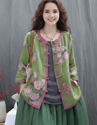 Women wearing vintage floral linen jacket with frog buttons
